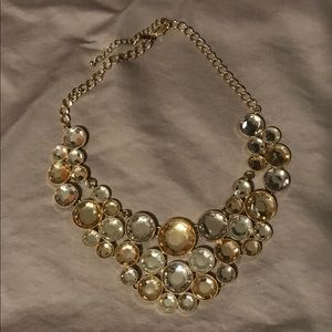 Gold accessory bib necklace.